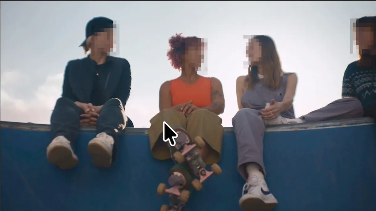 Four people sitting on a skate ramp, each face pixelated in the Premiere Program Monitor.